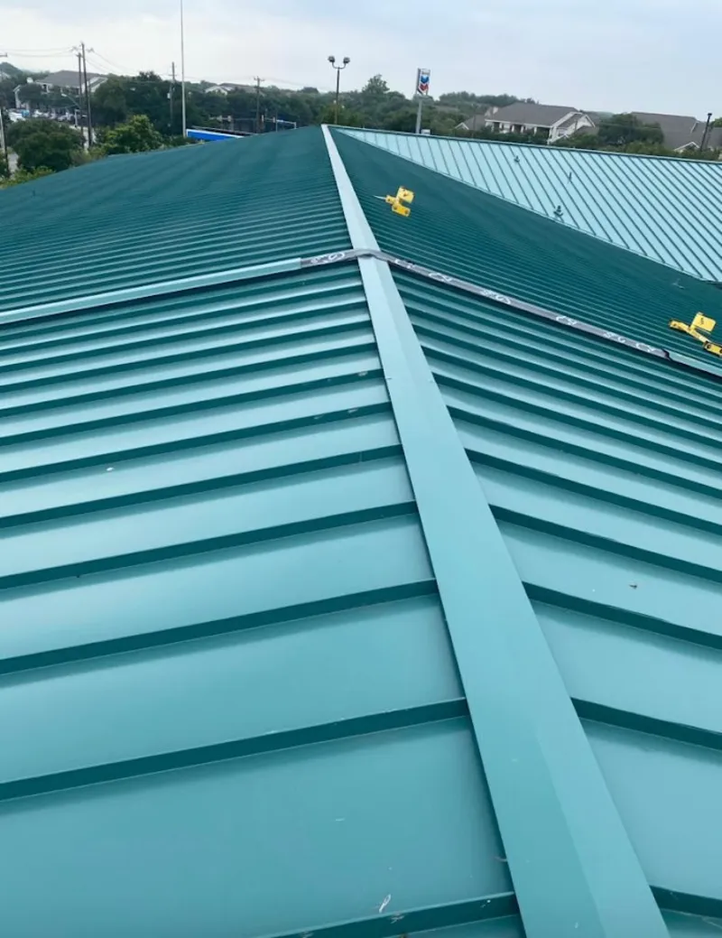 Green commercial metal roof ridge and valley for Metal Roof Repair in Yoakum