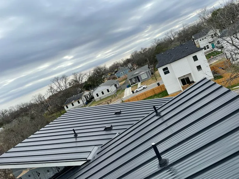 Standing seam metal roof panels with vents for Skylight Repair in Yoakum